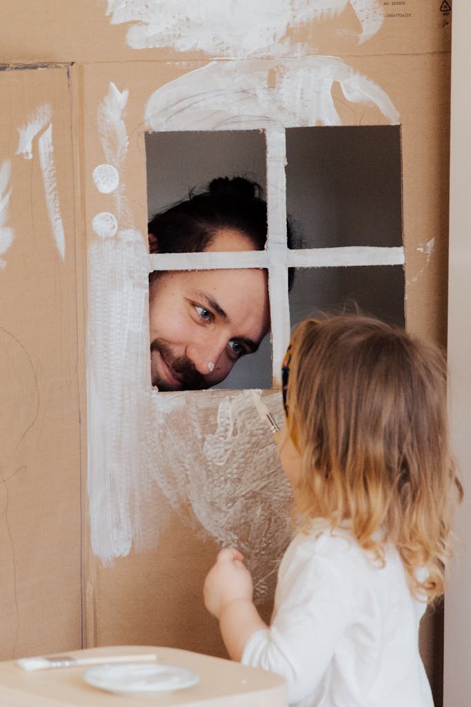 a man playing with his little daughter 3933232 683x1024 1